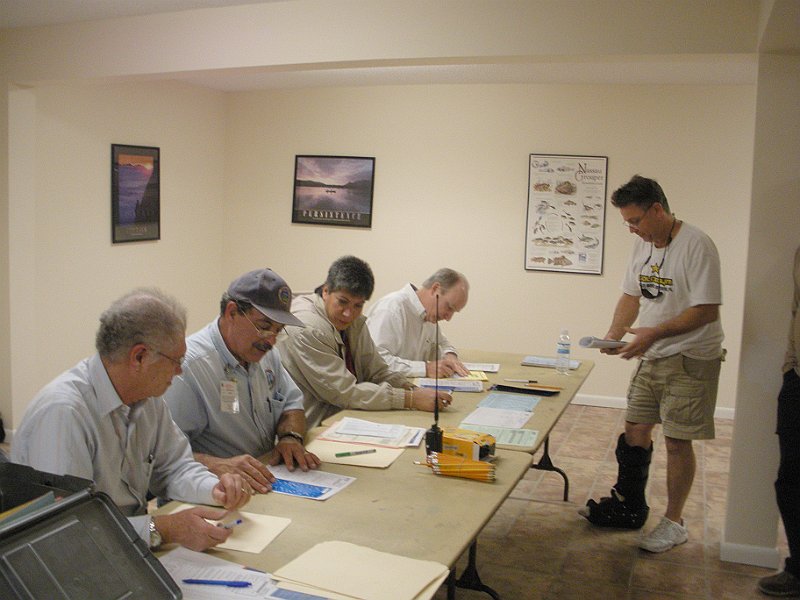 Exam 01 021709.jpg - Standing is Brian Hamm, one of the new ham's , but passed both his Technician and General exam this evening. Welcome aboard Brian!